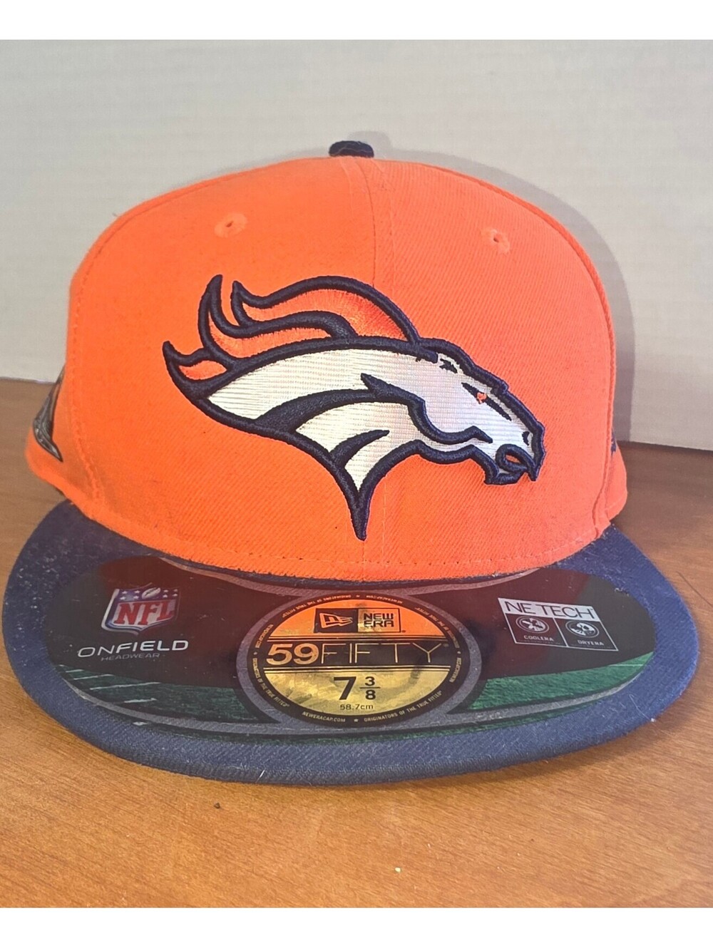 Men's Denver Broncos flat bill size 7 and 3/8